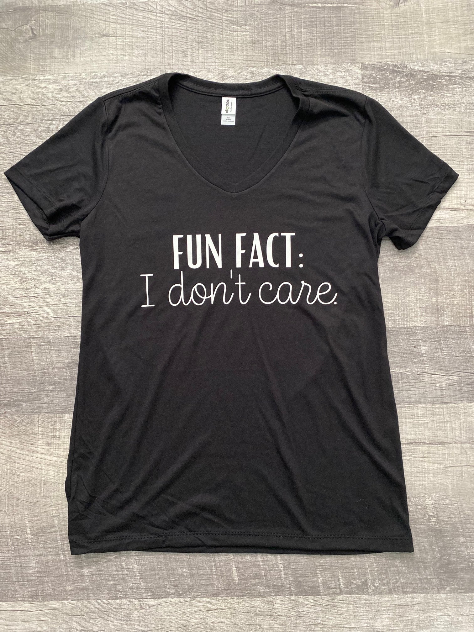 Black V-Neck T-Shirt with "FUN FACT:" printed on the front and then "I don't care." printed below it.