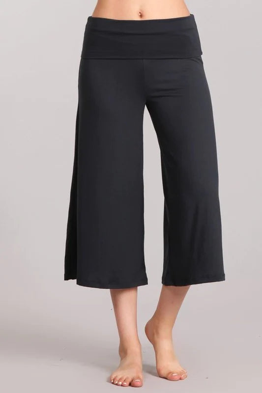 Dark grey mid-calf wide leg pants with a fold over wide waist band